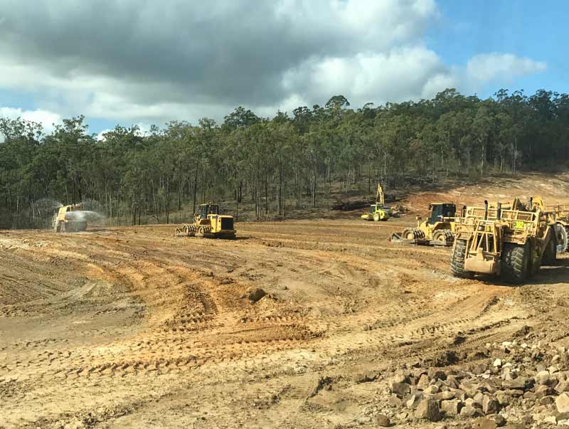 Sunshine Coast Water Carts Moxy TA40 providing dust suppression on the Shadworth Springfield Rise project